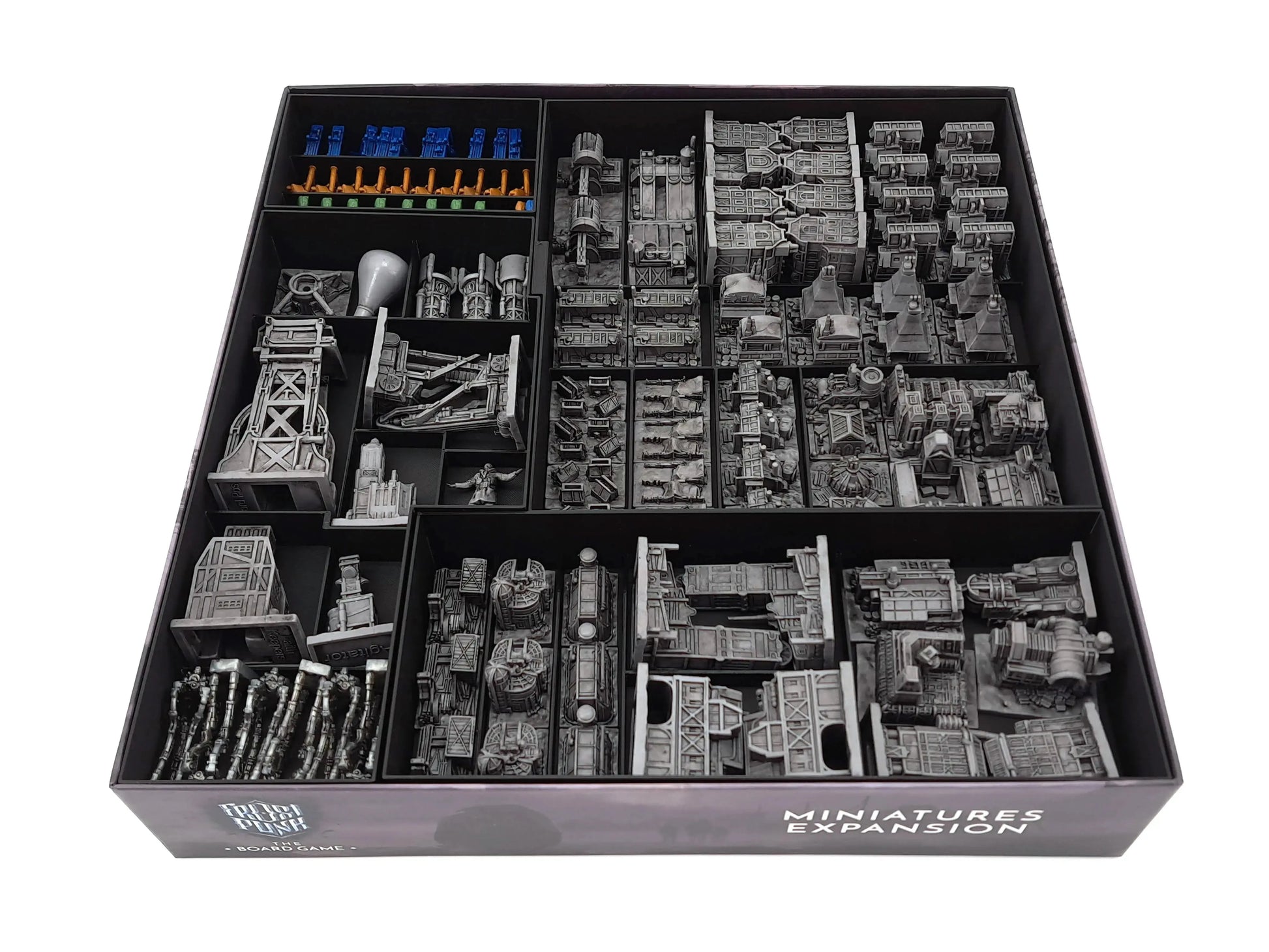 A wide view of the organized Frostpunk game box without the rulebook. It shows the detailed Generator miniature, hexagonal tiles, a cloth bag, small cards in vertical slots, and the labeled large card dividers neatly arranged.