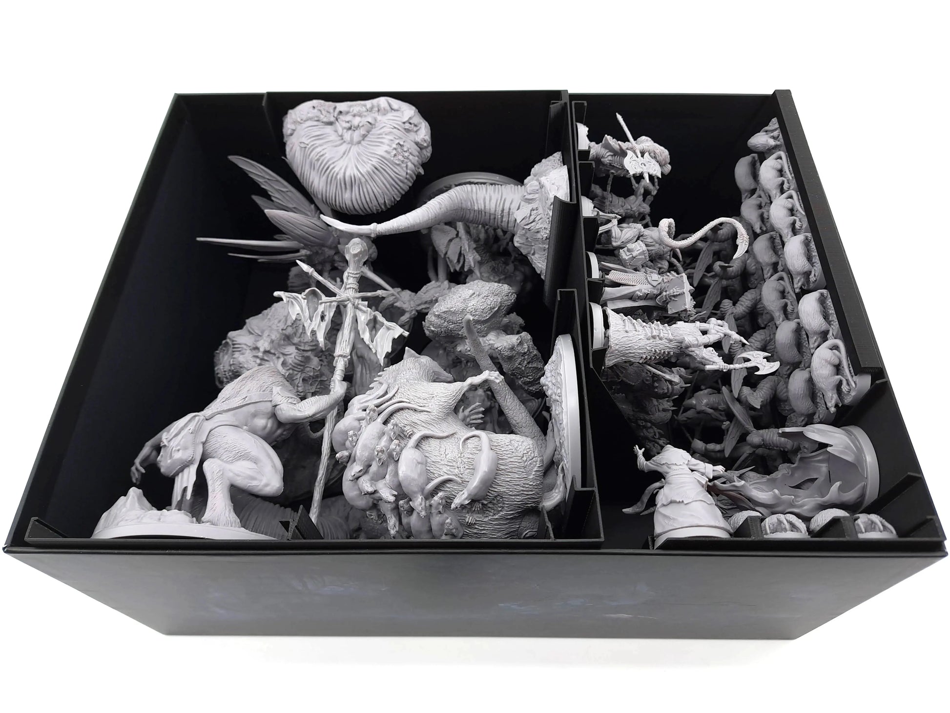 Black 3D-printed insert tray by Tinkering Paws filled with large Oathsworn miniatures. The left side contains massive boss figures in a spacious compartment, while the right side stores numerous medium and small minis upright in vertical slots. This 3D-print upgrade organiser offers space-saving storage, fast set-up, easy clean-up, and secure protection for board-game minis and expansions.