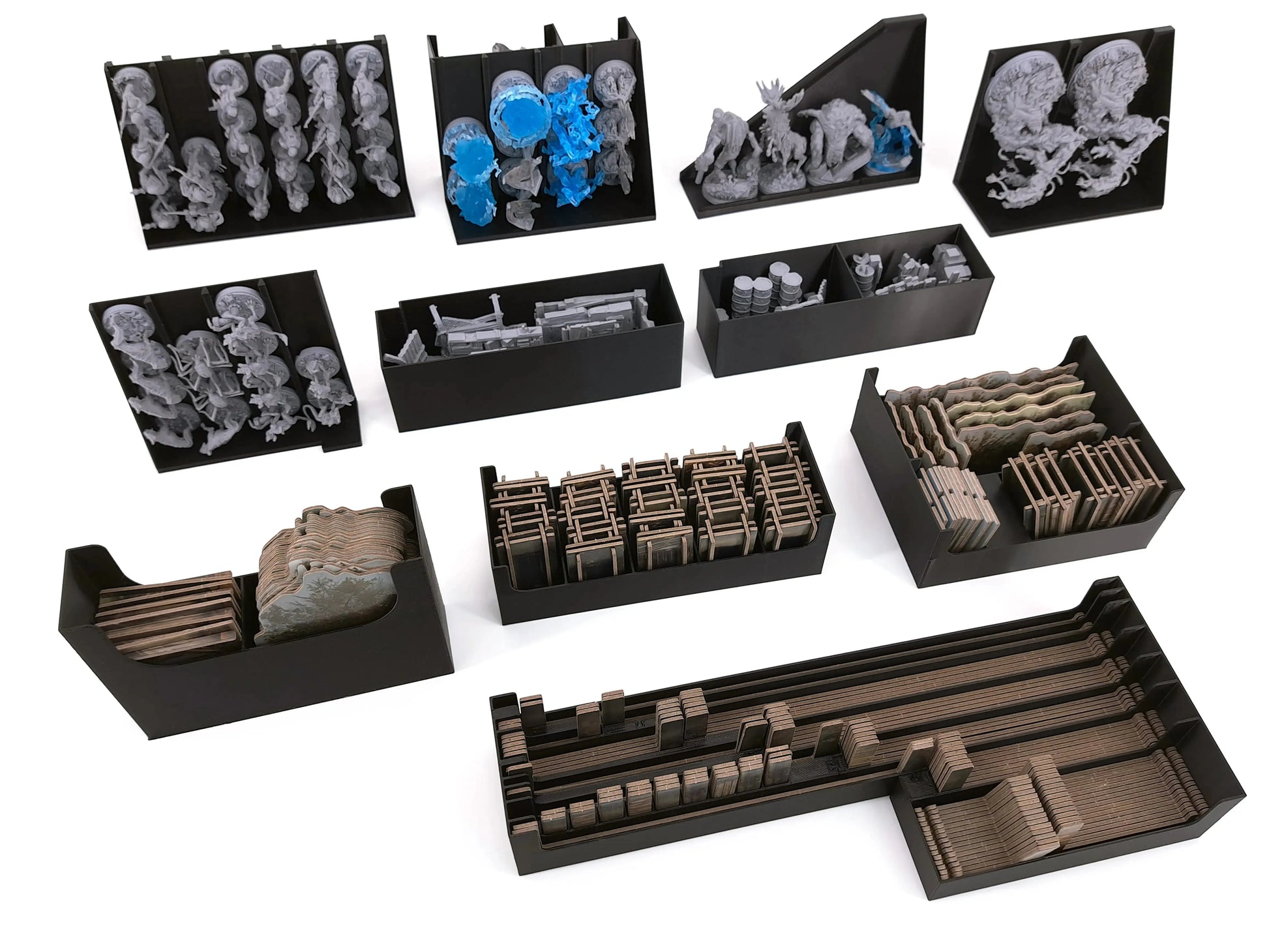 Modular storage trays from the STALKER: The Board Game Insert, showing separated compartments for all miniatures, Anomalies, and terrain components.