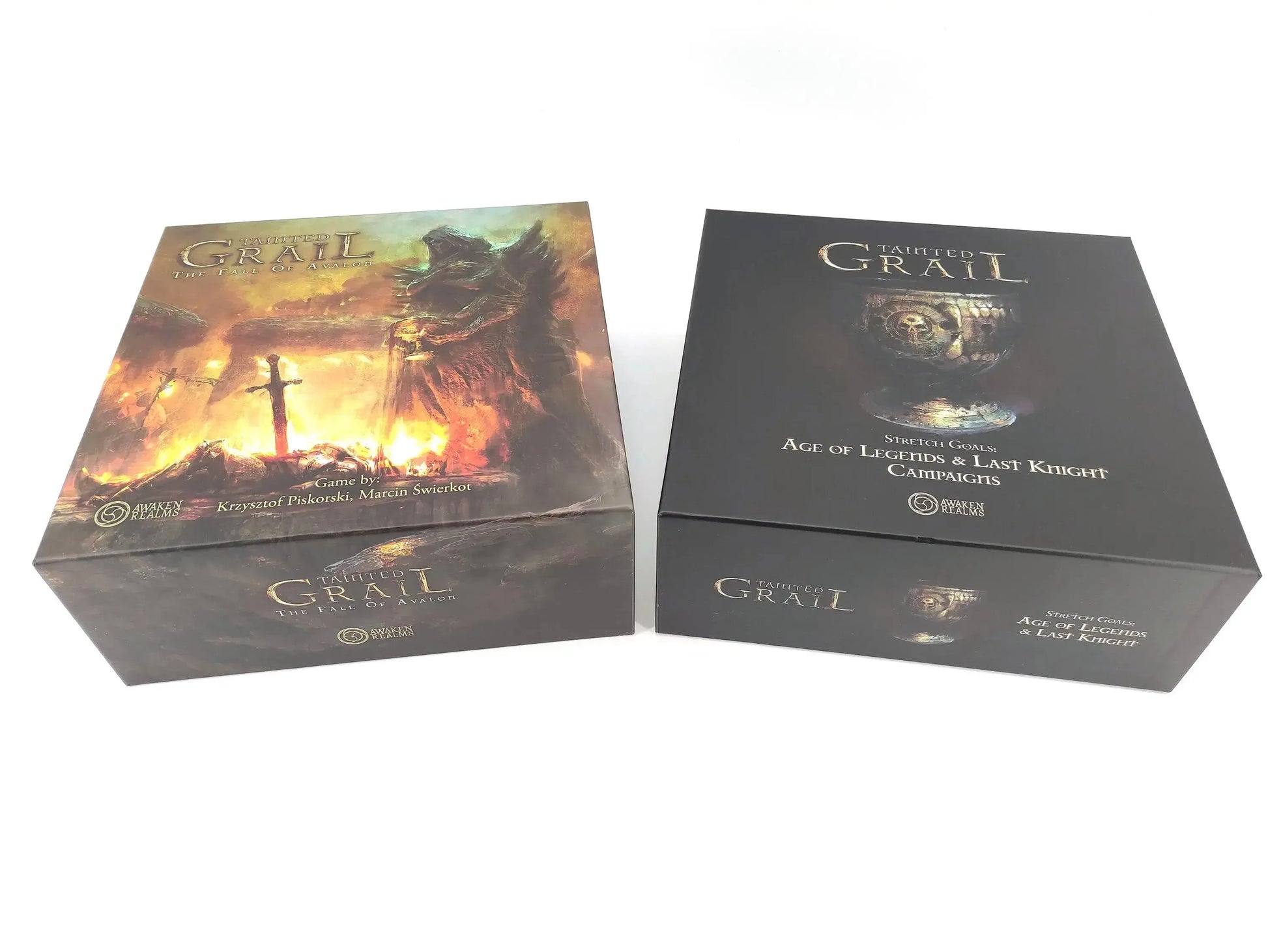 Tainted Grail board game boxes showing Fall of Avalon core game and Age of Legends & Last Knight campaigns, compatible with 3D printed storage insert by Tinkering Paws, board game accessory for organized and space-saving storage